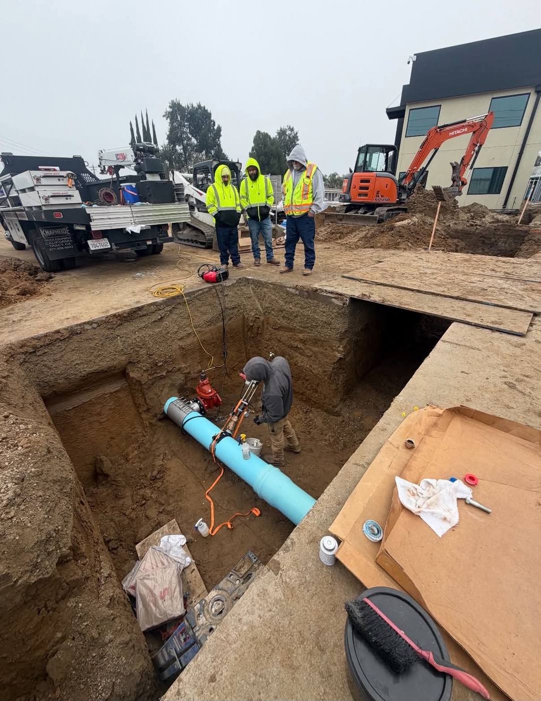 crew pipe excavation